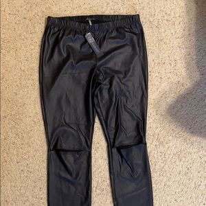 Blue Heaven pleather leggings with knee slits.